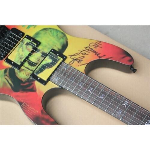 Free shipping custom 6 string guitar,pattern body,skeleton inlay,tremolo bridge,HH pickups,neck set in body