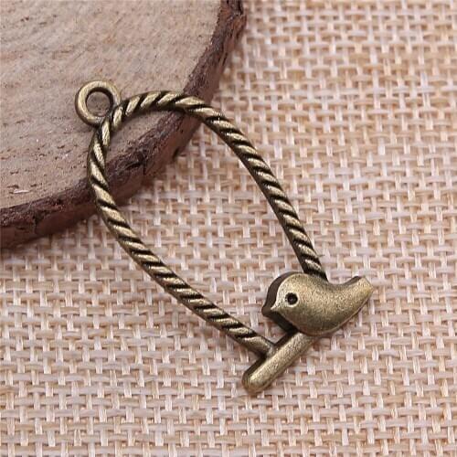 Free shipping 38pcs 35x17mm antique bronze bird charms diy retro jewelry fit Earring keychain hair card pendant accessories