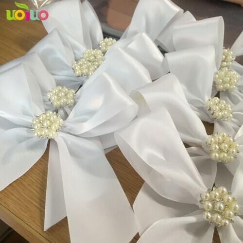 Hot sale decoration butterfly ribbon tied white cream bow with big flower rhinsestone brooch buckle