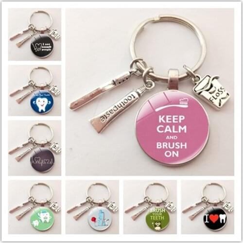 New Creative Cute Cartoon Teeth Pattern Dentist Medal Keychain Childrens Gift Glass Dome Pendant Keyring Hoilday Party Souvenir