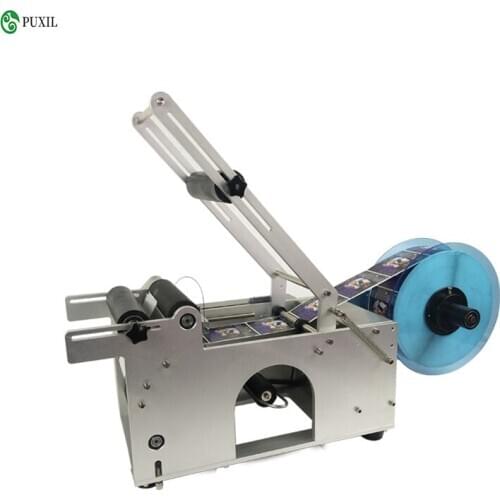 MT50 self-adhesive labeling machine semi-automatic round bottle labeling machine small hand-held glass bottle manual labeling