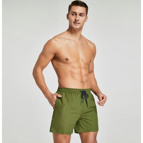 2021 New Mens Summer Beach Pants Casual Solid Color Best-Selling Pocket Pants Swimming Beach Vacation Straight Shorts Beachwear