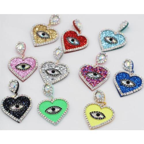 Fashion temperament gorgeous simple heart-shaped rhinestone eyes earrings tourist street shoot catwalk nightclub earrings 955