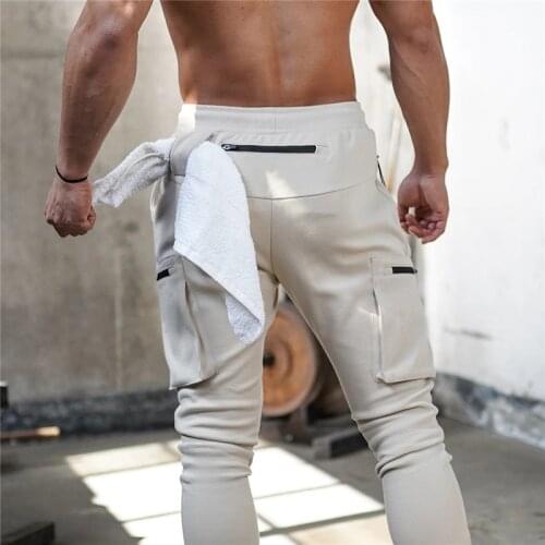 2021 NEW multi-pocket Men Pants Fitness Casual Elastic Pants men Bodybuilding Sports trousers men Sweatpants Joggers gyms Pants