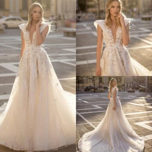 2020 A Line Wedding Dresses Deep V Neck Lace Cap Sleeve Bridal Wedding Gowns Plus Size Feather robes de mariée