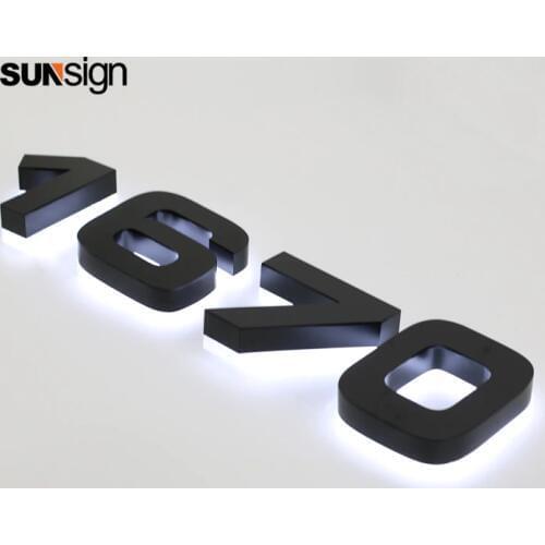 Outdoor lighted channel letter sign backlit halo lit house number