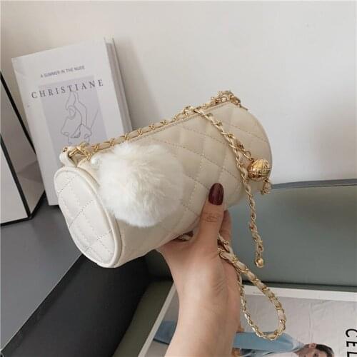 Fashion cylinder female new style rhombus chain small bag trendy Korean version of hair ball fashion one-shoulder messenger bag