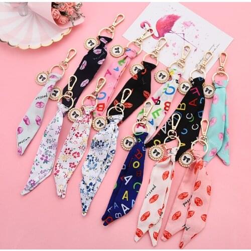 Exquisite Handbag Accessories Key Chain Ribbon Silk Fabric Keychain Flower Letter Lips Print Bows Keyring for Women Bag Car