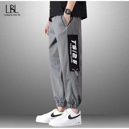 New Mens Fashion Joggers Casual Pants Fitness Men Sportswear Tracksuit Sweatpants Trousers Men Hip Hop Trousers Plus Size 2021