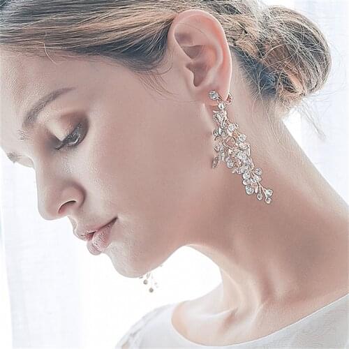 Handmade creative forest jewelry, fresh golden rhinestone leaf earrings, earrings worn by women’s balls