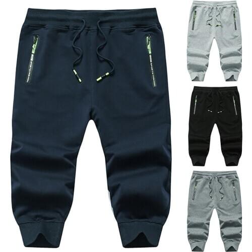 Men Casual Breathable Drawstring Zipper Pockets Sports Capri Pants Trousers Sports casual cropped pants with zipper pockets