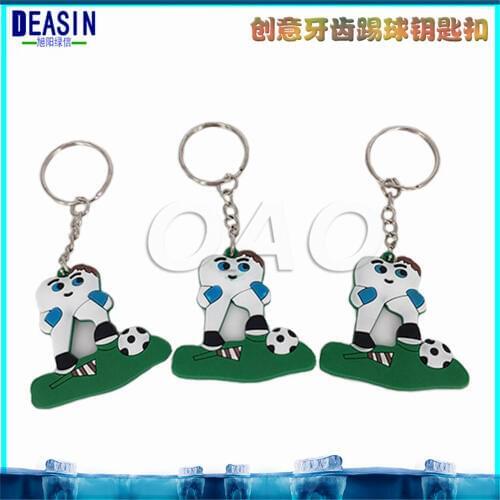 Cartoon metal commemorative key buckle dental gift new exquisite teeth playing football key buckle dental gifts