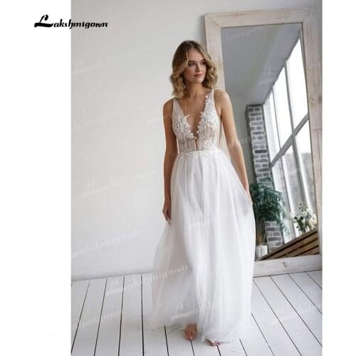Sexy Tulle A-Line Wedding Dresses Illusion V-Neck Sleeveless Corset Beading Appliques Sweep Train Bride Gowns Off The Shoulder
