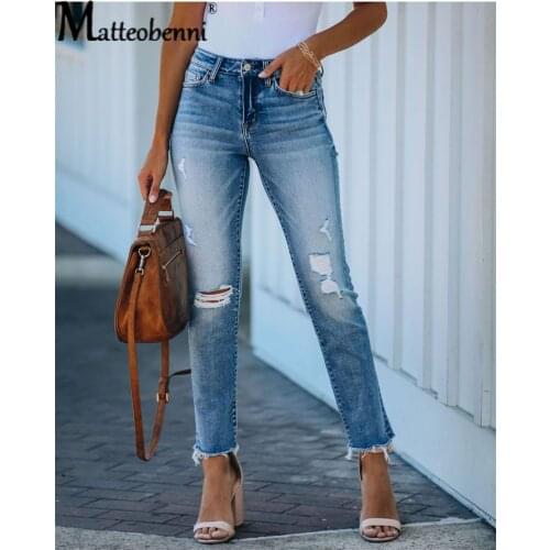 New Casual High Waist Ladies Denim Trousers Spring And Autumn Fashion Tattered Little Feet Pencil Pants Solid Color Ladies Jeans