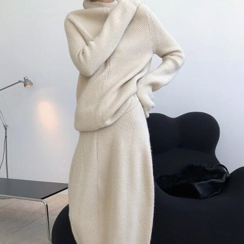 Autumn and winter womens casual solid color high-neck long-sleeved loose sweater + high-waist knitted skirt suit