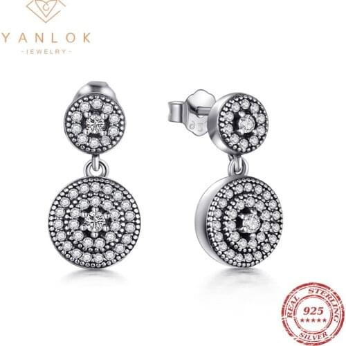 YANLOK 925 Sterling Silver Radiant Elegance Earrings Clear CZ Crystals Surrounded Ancient Silver Women Drop Earings Fine Jewelry