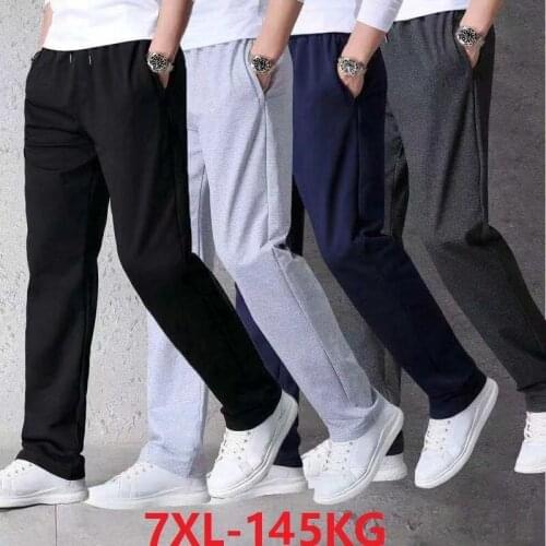 Autumn spring Men sports pants straight pants big sales cheap plus size 6XL 7XL big size loose elasticity Stretch pants 60 64 66