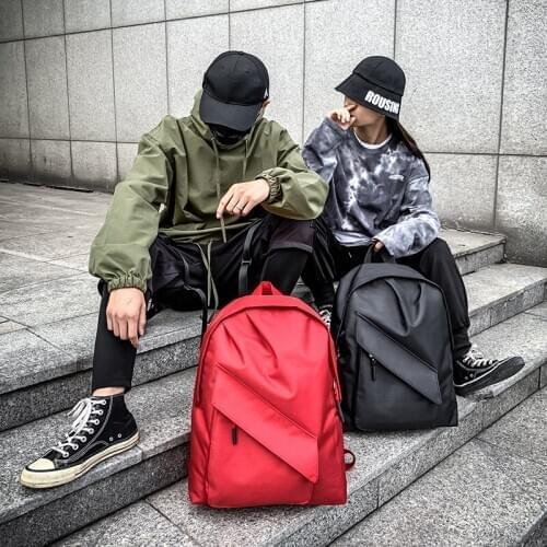 Korean version of the new simple solid color backpack tide brand men and women campus large-capacity Oxford school bag backpack