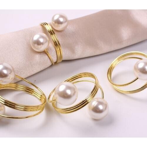 4pcs / metal imitation pearl spring napkin ring desktop decoration is used for family parties, weddings, Western food and hotel