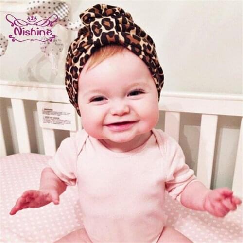 Nishine Fashion Baby Girls Leopard Print Donut Hats Toddle Flower Bowknot Beanie Children Headwear Holiday Gift Party Decoration