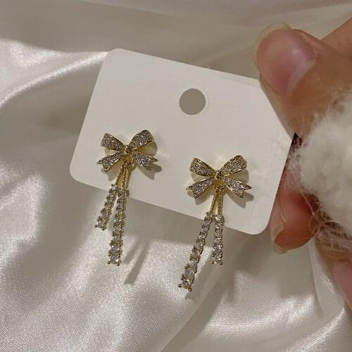 Korean Exquisite Full Rhinestone Bow Long Earrings Temperament Luxury Shinny Zircon Bowknot Clip on Earrings No Hole Women