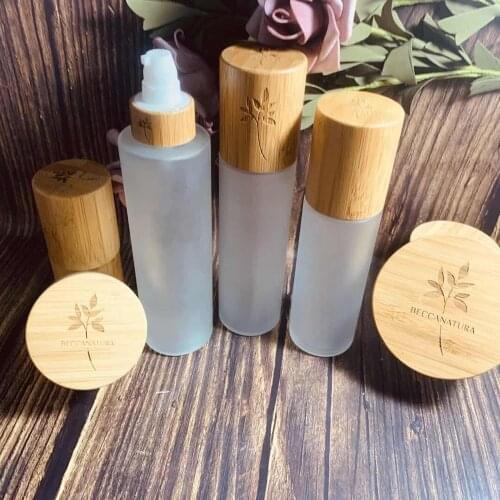 4 oz Natural Bamboo Lid Glass Frosted Lotion Bottles with bambu toner Pump eco friendly 4 oz bamboo cosmetic glass spray bottle