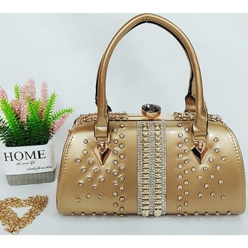 2021 Metal wrist fashion handbag for women gold evening bag PU leather shoulder bag