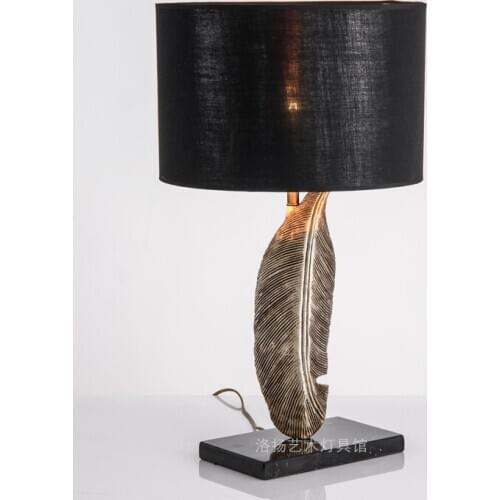 Modern minimalist sofa next to the living room table lamp art model room study bedroom bedside table lamp