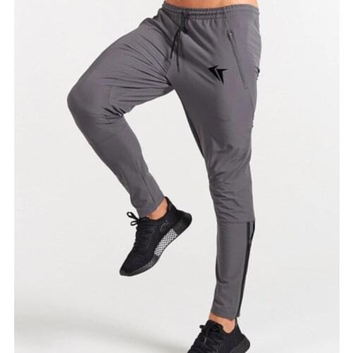 2021 spring and autumn sports trousers mens casual small feet zipper outdoor trousers running training fitness pants men
