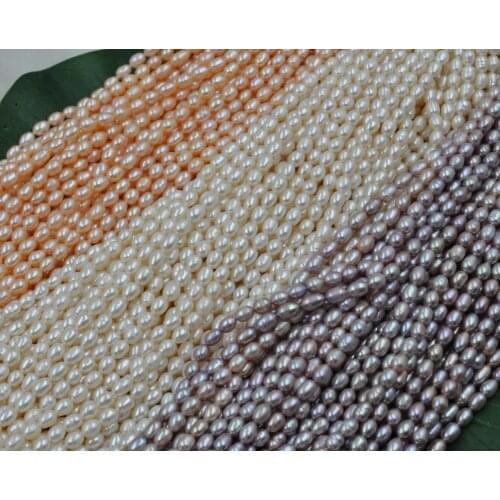 Wholesale 12 strands genuine rice freshwater pearl white pink purple