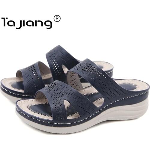 Ta Jiang New thick-soled slope heel slippers European and American fashion hollow summer female gladiator beach slippers T777-2