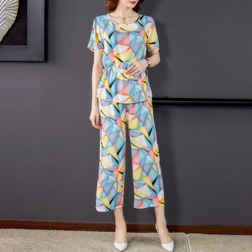 2021 Summer New Womens Cotton Short-sleeved Slimming Waist Lace-up Top + Loose Nine-point Wide-leg Pants Two-piece Suit Y638