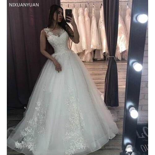 Tulle Wedding Dress with Lace Appliques Sequins Sheer Jewel Neck Illusion Back Covered with Buttons Vestidos De Novia