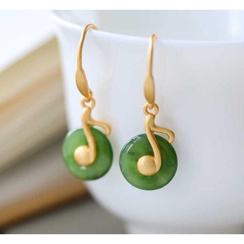 Designer original new Hetian jade music charm earrings elegant and noble temperament ladies silver jewelry