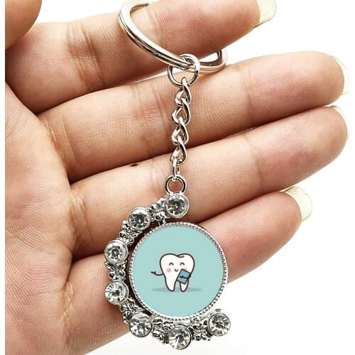 New Personality Cute Protect Teeth Mood Double-sided Rotating Crystal Pendant Keychain Glass Convex Round Keychain Children Gift