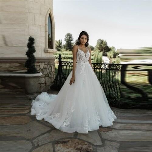 Sexy Spaghetti Strips Ball Gown Wedding Dresses Lace Appliques Backless Princess White Bridal Gowns Sleeveless Spring Long