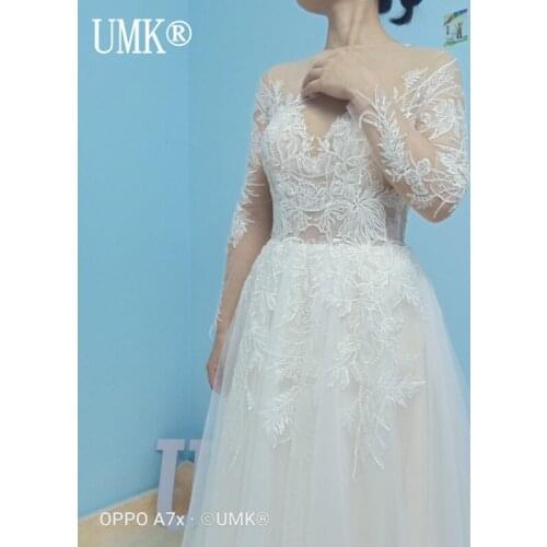 UMK Lace Long Sleeve Wedding Dress Sexy Open Back A-Line Tulle Appliques Beading Luxury Bridal Gowns