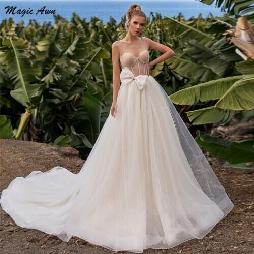Magic Awn Shiny Champagne Beach Wedding Dresses Illusion Beaded Bow Princess Boho Mariage Gowns Sweep Train Vestidos De Novia
