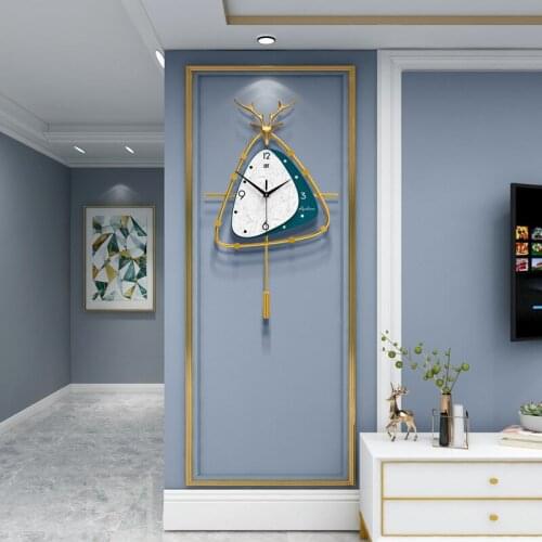 Nordic Light luxury clock wall clock living room household fashion deer head triangle wall clock special wall clock