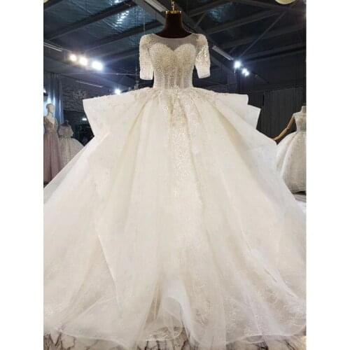 Gorgeous Lace Appliques Wedding Dress 2021 Luxury Beads Short Sleeves Beaded Boat Neck Princess Bride Gown Plus Size