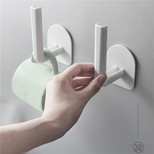 2020 New Simple Kitchen Roll Paper Hanger with Non-marking Stickers Drain Hole Design Punch-free Household Organizing Tool