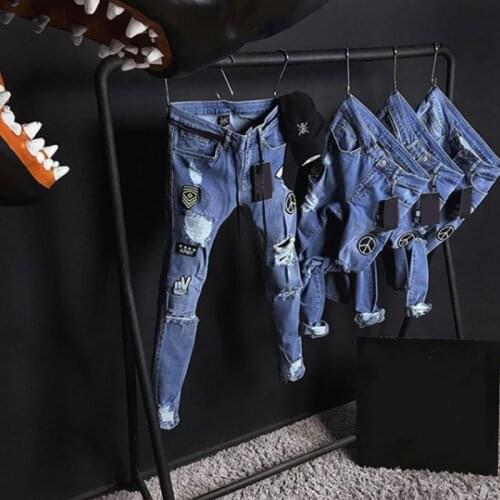 Mens New Denim Trousers With Holes Insignia Elastic Tight Legs Are Popular