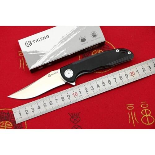 TIGEND 1011 Flipper folding knife D2 blade G10 + steel handle Camping Hunting Outdoor Survival Pocket Kitchen knives EDC tools