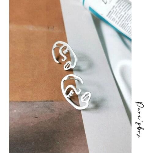PerisBox Gold Silver Color Hollow Face Small Stud Earrings Abstract Character Studs Earrings Personality Unique
