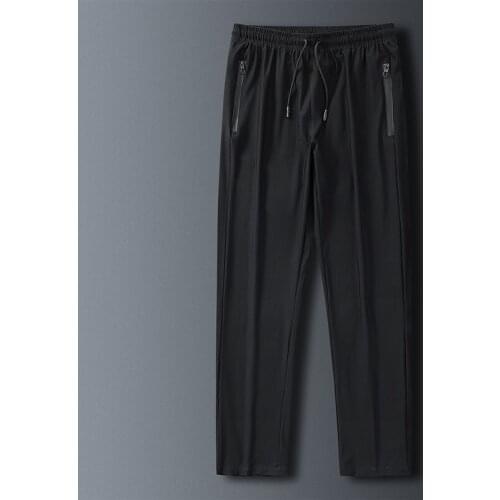 New Korean Quick Drying Ice Silk Pants MenS Summer Ultra Thin Sports Leisure Pants Boys' Loose Large Air Conditioning Trousers