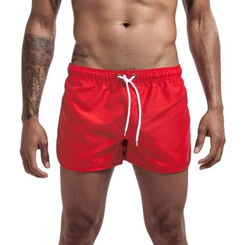 Plus Size Men Fashion Beach Shorts Polyester Quick-Drying Loose Solid Sports Elastic Waistband with Drawstring Three-Point New