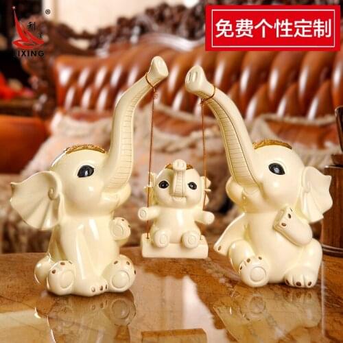 The wedding gift ideas for a family of three living room TV cabinet cabinet Home Furnishing elephant elephant ornament craft orn