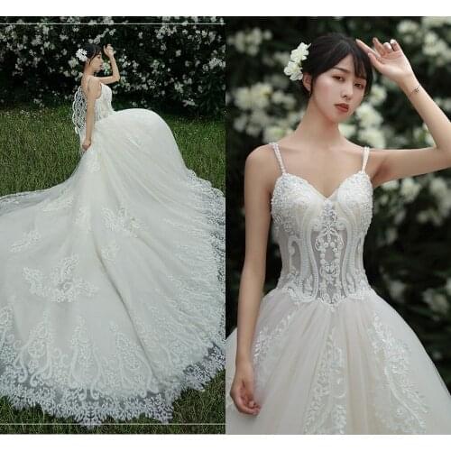 2020 New Lace Appliques Wedding Dress Vestidos de novia Spaghetti Straps Beads Sexy Bridal Gown Elegant Backless Wedding Gowns