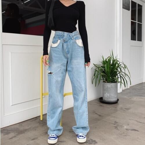 Women cross waist hole jeans