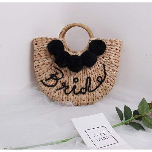 New semi-circular hollow straw bag colorful hair ball fairy woven bag shoulder portable super fire beach Messenger bag Character
